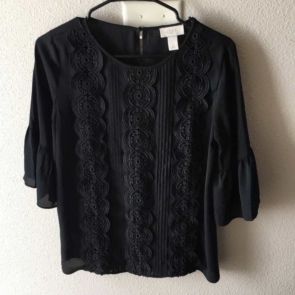 Black 3/4 blouse with front detail, worn once.